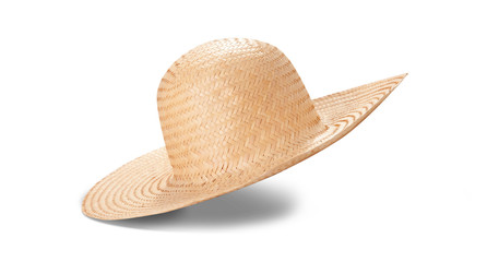 Pretty straw hat with ribbon and bow on white background. Beach hat top view isolated - obrazy, fototapety, plakaty