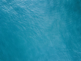 Fototapeta na wymiar Aerial view of the ocean surface, background with copy space