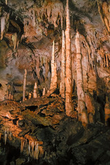 The beautiful stalactites and stalagmites and other rock formations are reflected in a small lake in the Antro del Monte Corchia cave in the Apuan Alps in Italy.