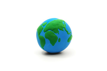 a clay globe on white