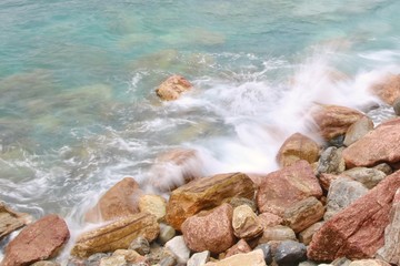 waves crashing on rocks