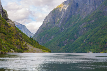 Panoramic view of Geiranger fjord near Geiranger seaport, Norway. Norway nature and travel background. View from the ferry on the fjord in Norway.