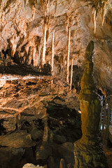 The beautiful stalactites and stalagmites and other rock formations are reflected in a small lake in the Antro del Monte Corchia cave in the Apuan Alps in Italy.