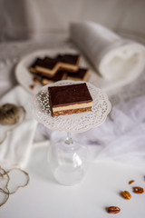 tasty chocolate authentic canadian dessert Nanaimo with nuts in healthy version - plant based and shugar free