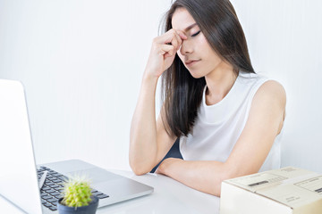 Start up small business entrepreneur SME or freelance woman working hard and feeling dizzy at home,...
