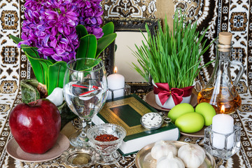 Tabletop with Haft-seen elements for Nowruz - 262798283