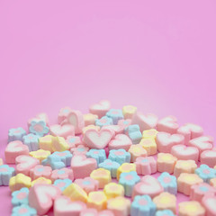 Fototapeta na wymiar Selective focus of sweet pastel color of marshmallows on pink background