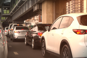 Fototapeta na wymiar cars jam on street or road with blur flyover