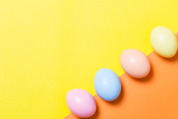 colorful easter eggs on yellow  background