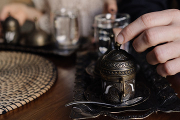 Turkish coffee in a beautiful traditional dishes