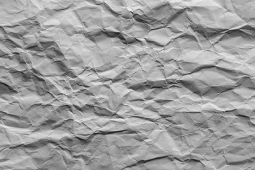 Crumpled gray paper with vignette background texture