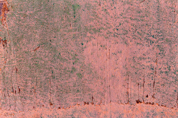 Old cracked rusty damaged painted metal background texture close-up