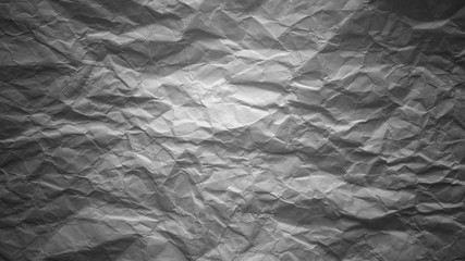 Crumpled gray paper with vignette background texture