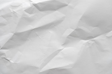 Fototapeta premium Crumpled white paper background texture
