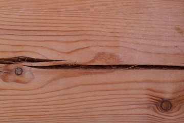 structure of wooden boards with longitudinal lines and knots
