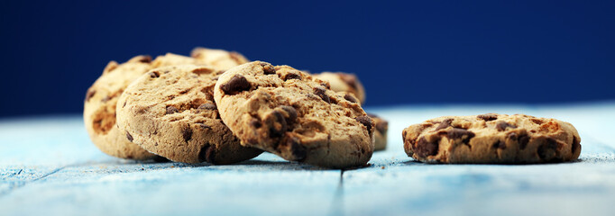 Chocolate cookies on wooden table. Chocolate chip cookies