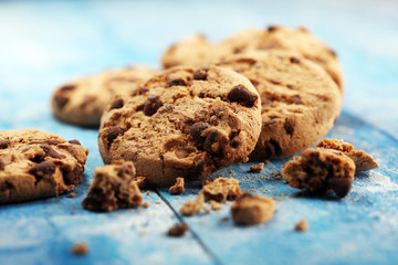 Chocolate cookies on wooden table. Chocolate chip cookies
