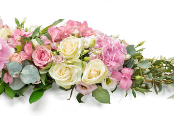 Gentle art composition. A bouquet from branches an eucalyptus, a hydrangea, Alstroemeria, gentle roses on white background