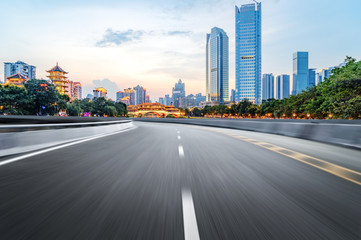 The expressway and the modern city skyline are in chengdu, China.