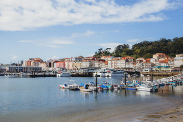 Fototapeta premium motor boats in the bay, view of the beautiful city, sunny Spain, the Atlantic Ocean, great view