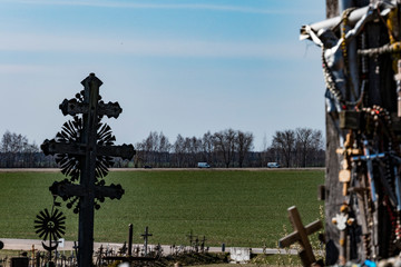 Siauliai, Lithuania Crosses and crucifixes at the Hill of Crosses, or, Kryžių kalnas, a pilgrimage site for Catholics and is a collection of 100,000 crosses.