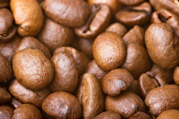 Roasted coffee beans, closeup. Background.