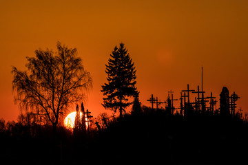 Siauliai, Lithuania Early morning and dawn view of The Hill of Crosses, or, Kryžių kalnas, a pilgrimage site for Catholics and is a collection of 100,000 crosses.