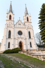 Fototapeta na wymiar The St. Mary`s Maternity and St. Michael the Archangel neogothic Church in Bolesław (Poland)