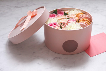 Gift set: a box of flowers and almond cookies