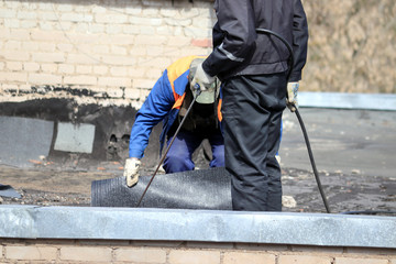 workers on the roof