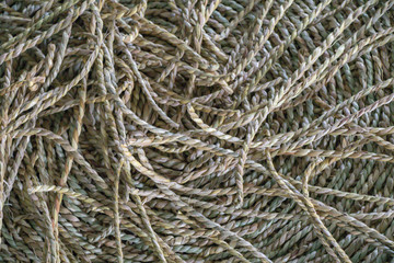 Wickerwork mat texture made from dry sedge background.Closeup surface texture of hand made craft work papyrus sedge.