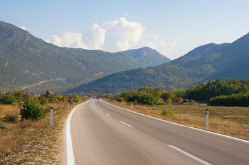 Naklejka premium Beautiful mountain landscape on sunny autumn day. Road trip through the Dinaric Alps. Bosnia and Herzegovina, Republika Srpska, Zubacko polje