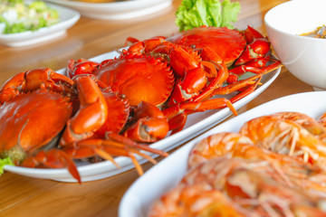 Steamed crabs with seafood spicy sauce.