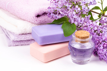 Obraz na płótnie Canvas Lilac nature cosmetics, handmade preparation of essential oils, perfume, creams, soaps from fresh and lilac flowers