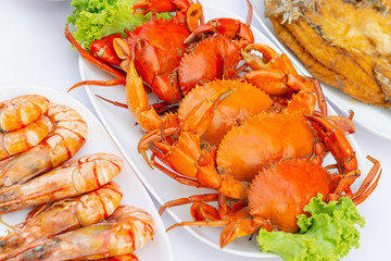 Steamed crabs with seafood spicy sauce.