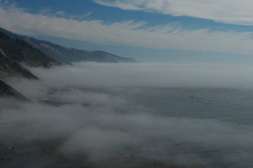 view of mountains in fog in Big Sur California USA