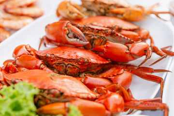 Steamed crabs with seafood spicy sauce.