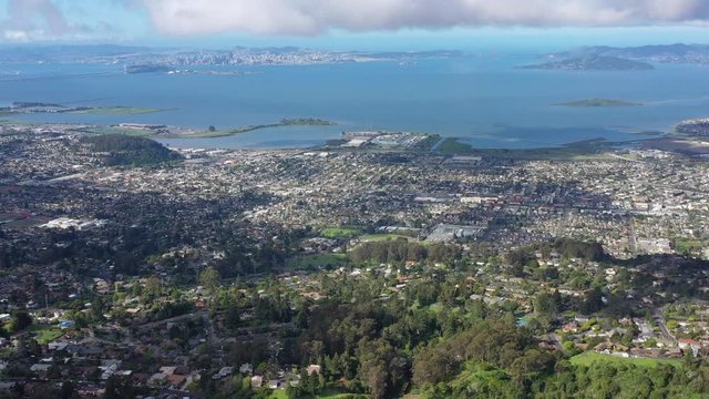 An aerial view of the congested East Bay cities of Berkeley, Oakland, El Cerrito and San Francisco Bay shows how densely populated this urban area is. 