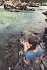 Woman resting at river