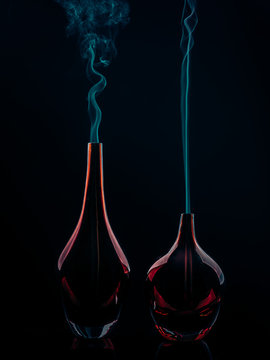 Glass bottles emitting smoke