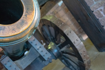 orrnately decorated brass cannon