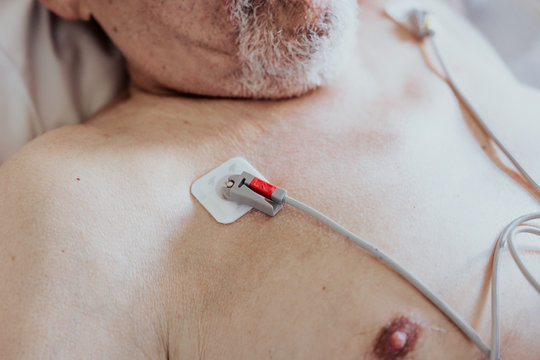 Older man admitted to a hospital room due to health problems