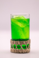 Close up green soft drink on white isolate background.