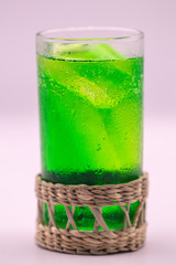 Close up green soft drink on white isolate background.