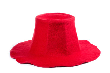Red felt wool hat on a white background