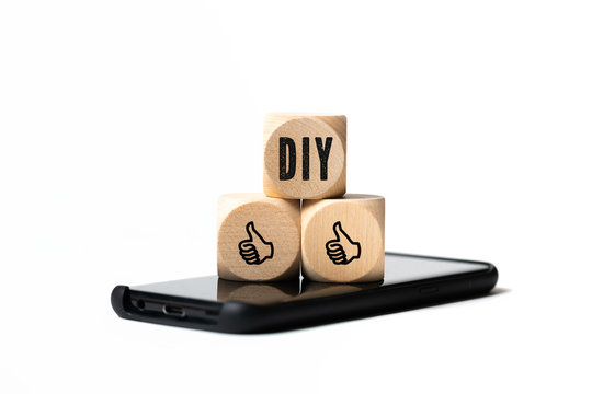 cubes with acronym "DIY" on a smartphone