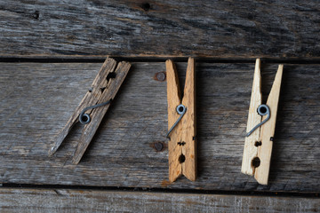 wood clothespins on vintage background