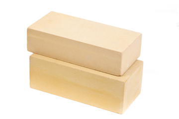 Two yellow ceramic bricks at the white background, isolated