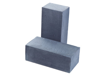Two grey ceramic bricks at the white background, isolated
