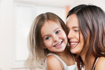 Happy Mother and daughter hugging